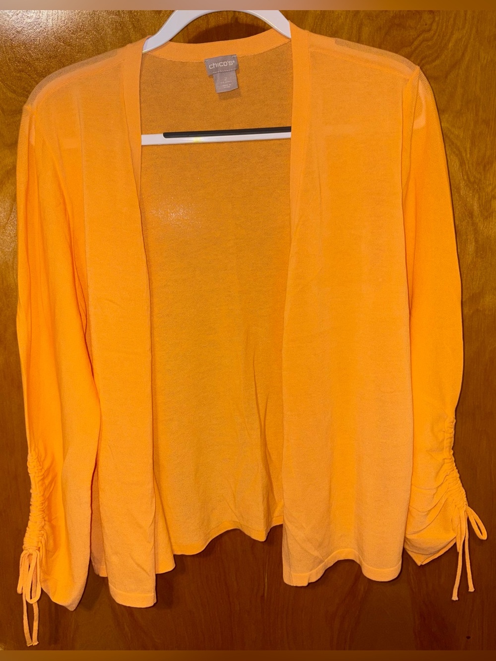Chico’s orange rayon knit open front cardigan sweater Size 2 ruched sleeves